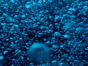 Blue bubbles under water